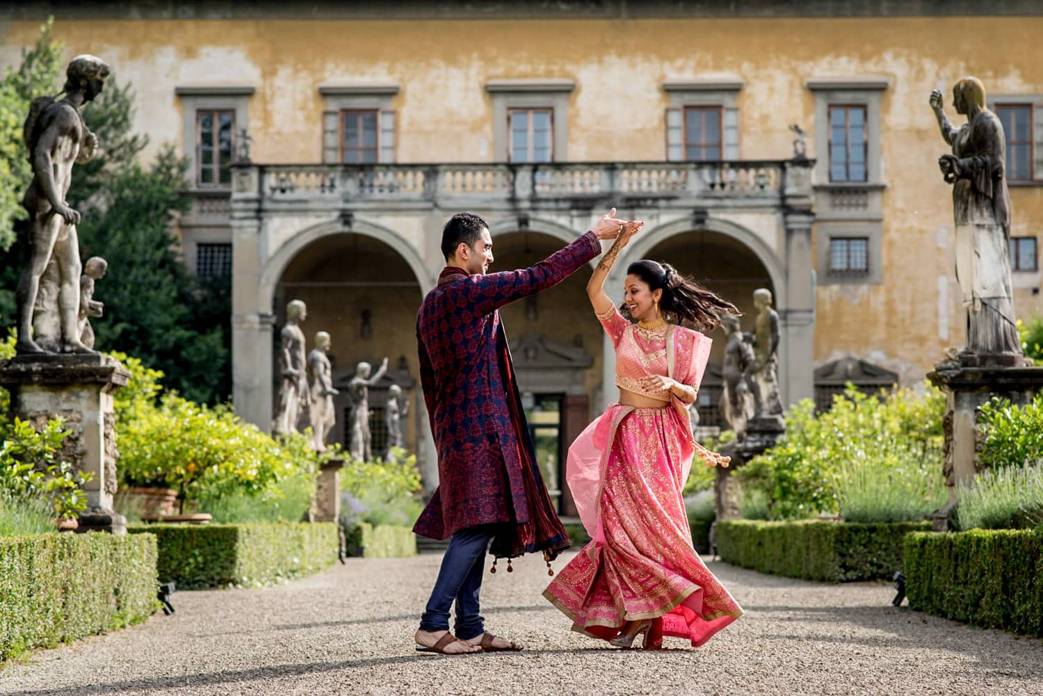 indian bride and groom dancing at their florence wedding in italy