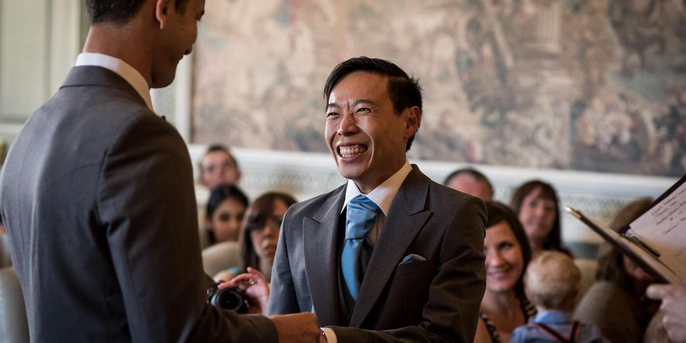 Groom smiling during ceremony at his Leeds Castle Wedding