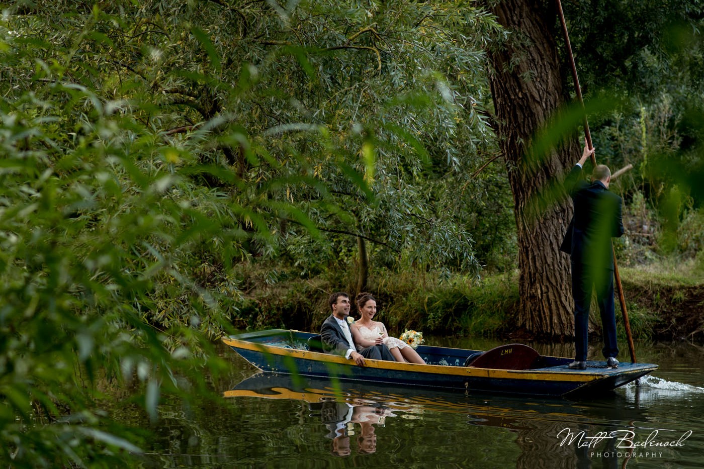 Punting at a wedding at Lady Maragret Hall | Oxford documentary wedding photography