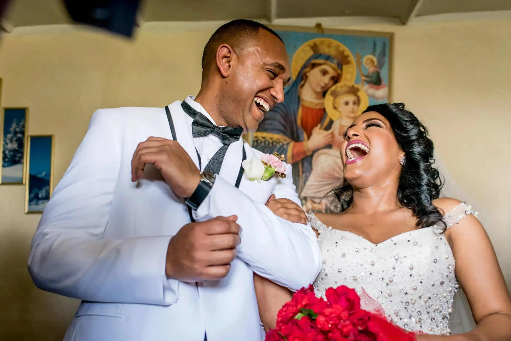 Ethiopian bride and groom laughing