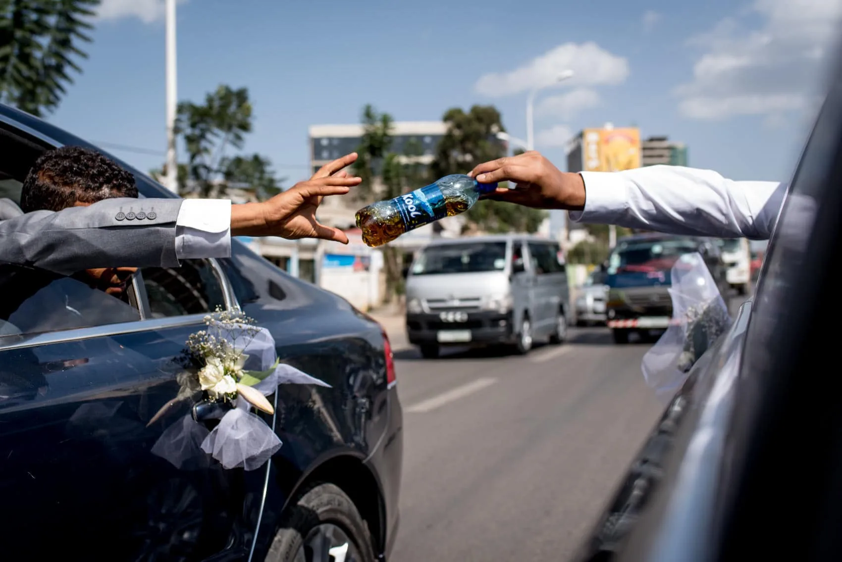 handing out whisky on the motorway in Addis Ababa