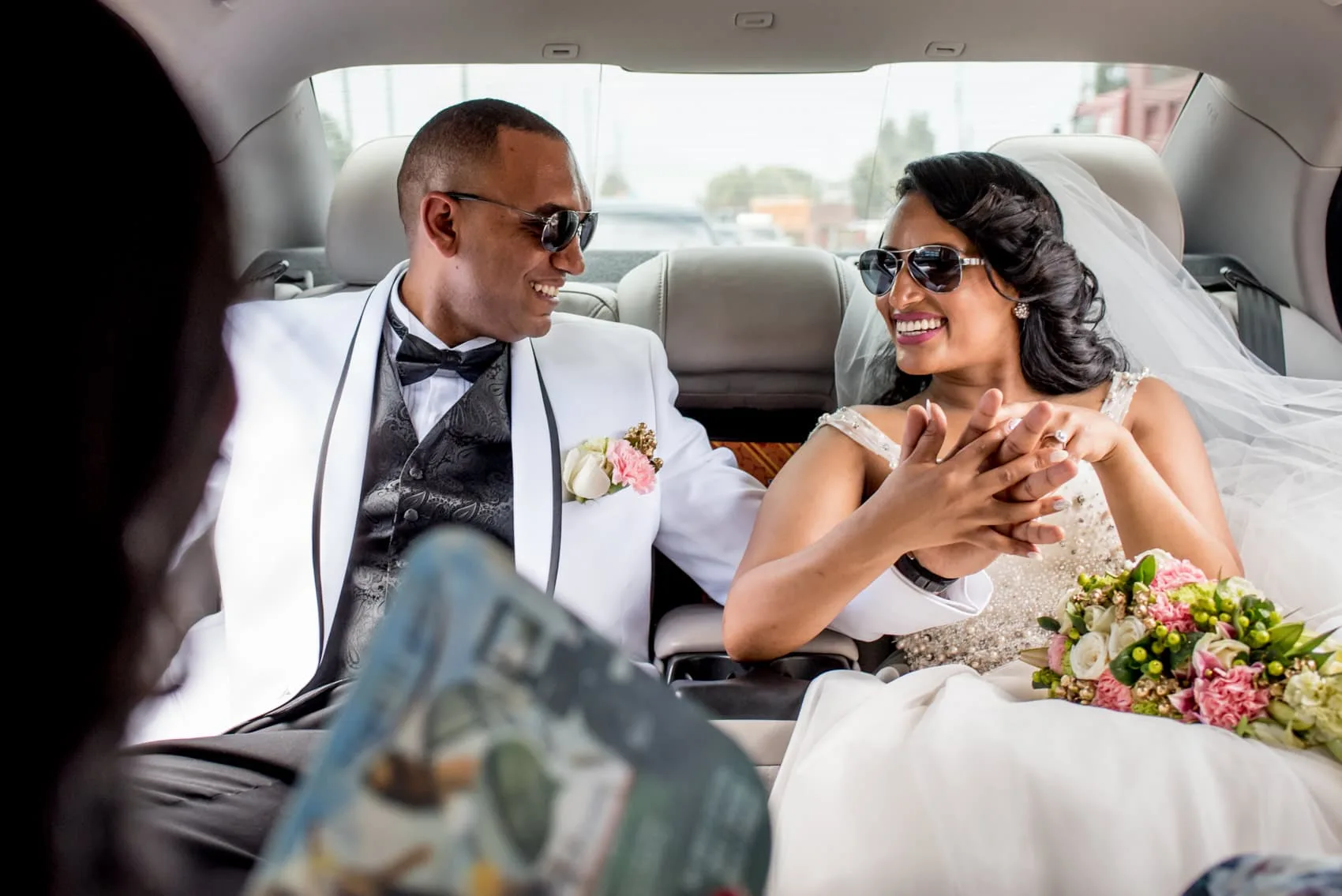 Ethiopian bride and groom in a limo