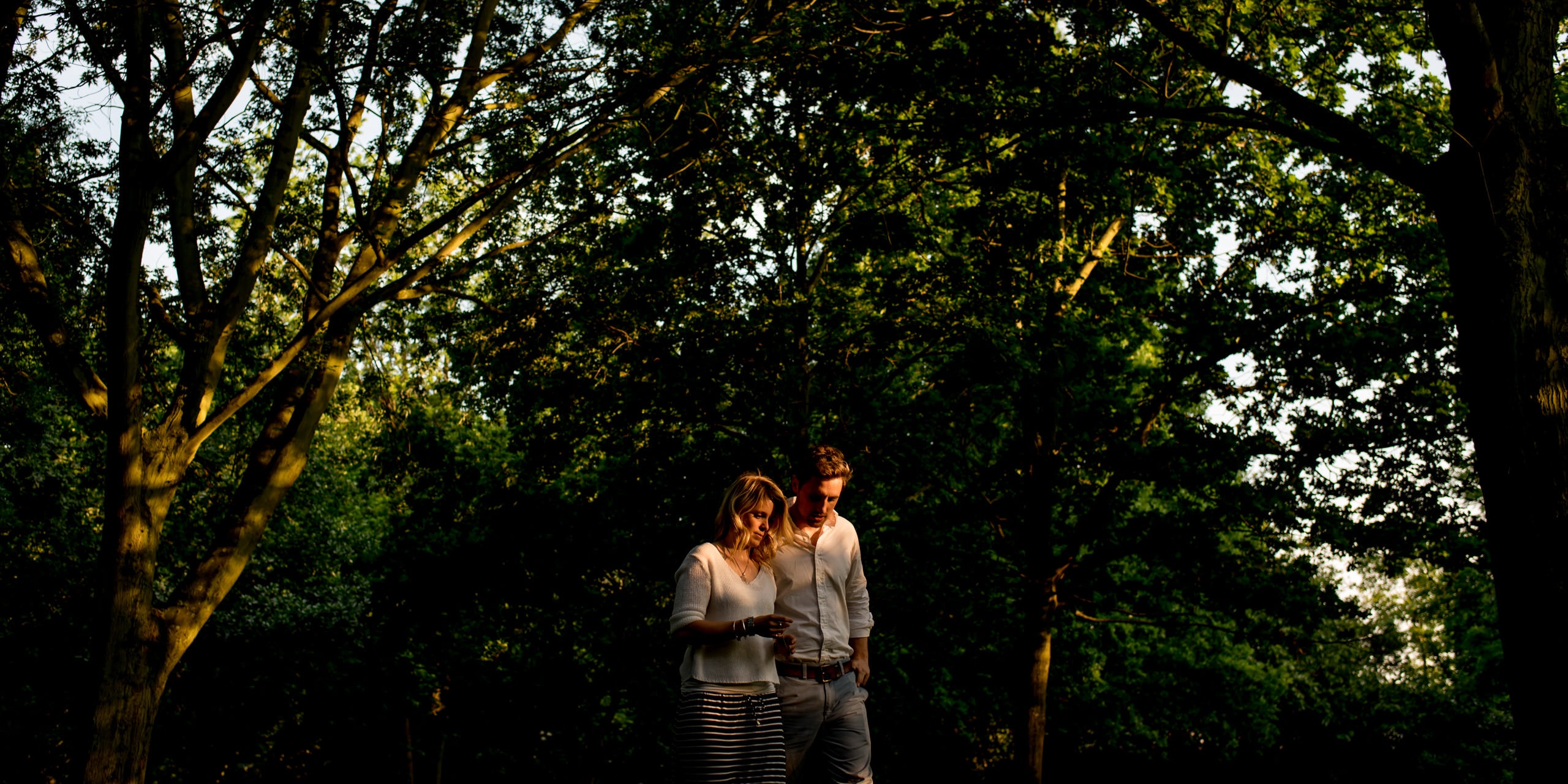 Couple in beautiful light in Regents Park during their Engagement Pictures