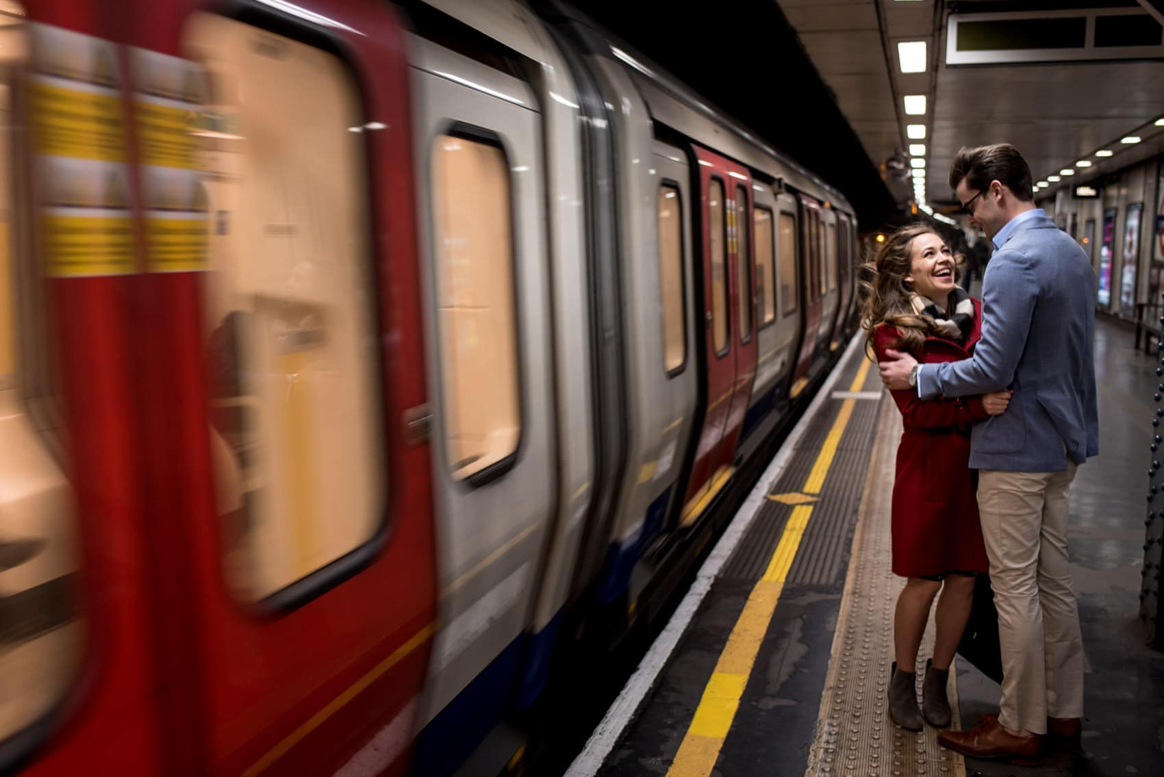 Photo of couple during their London underground engagement shoot