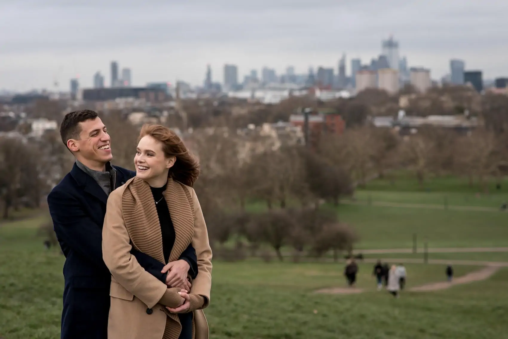 Photo of couple who just got engaged in primrose hill, one of the best London locations for a proposal