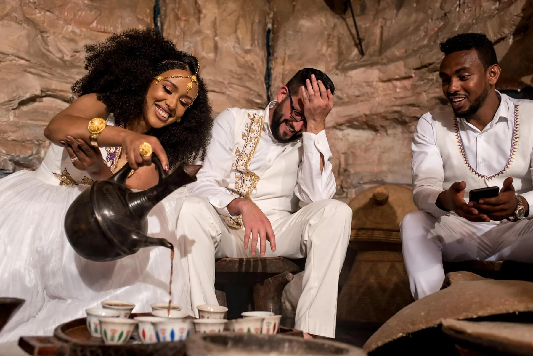 couple during coffee ceremony during their Ethiopian/ US fusion wedding