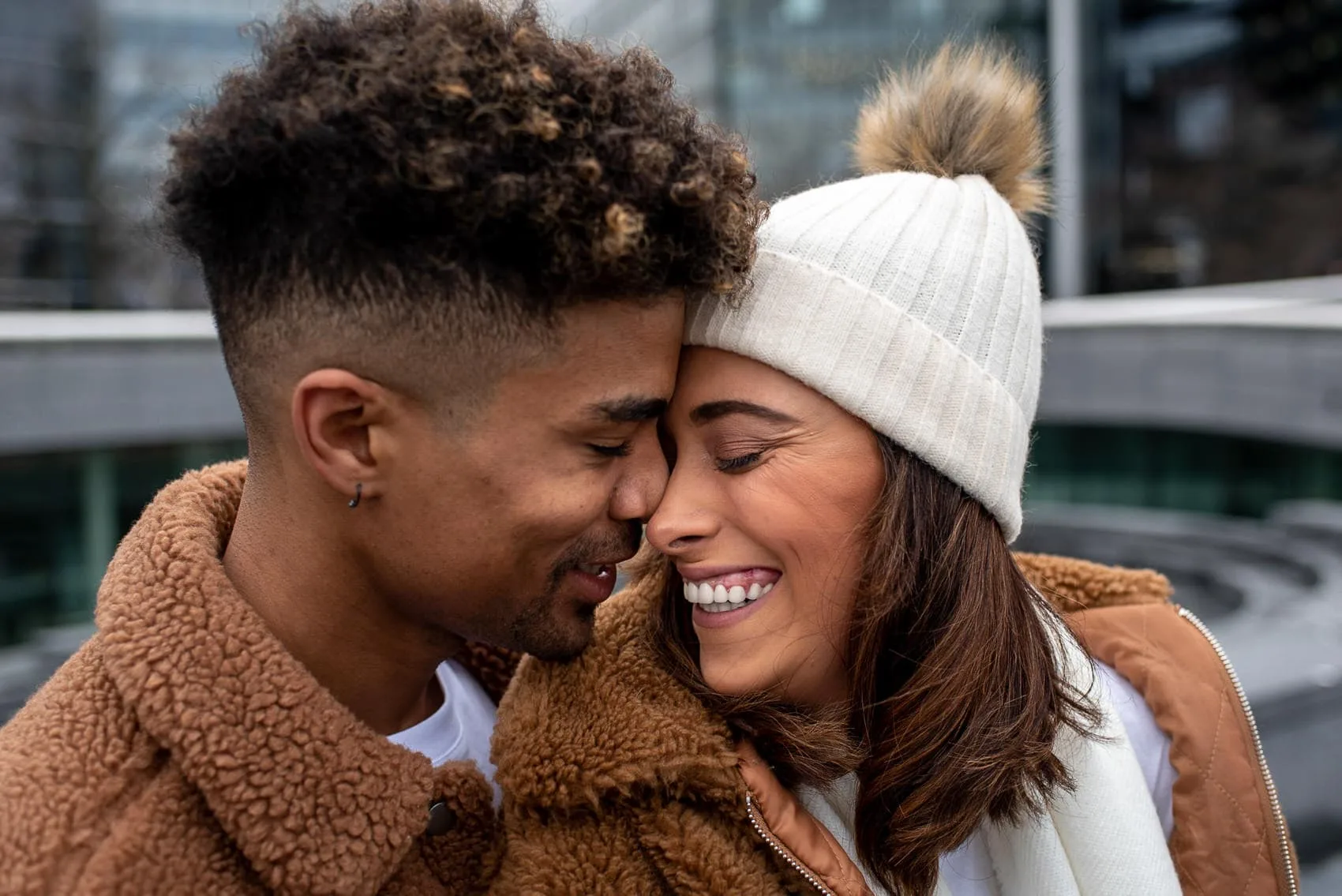 Couple kissing in love on their london wedding proposal shoot