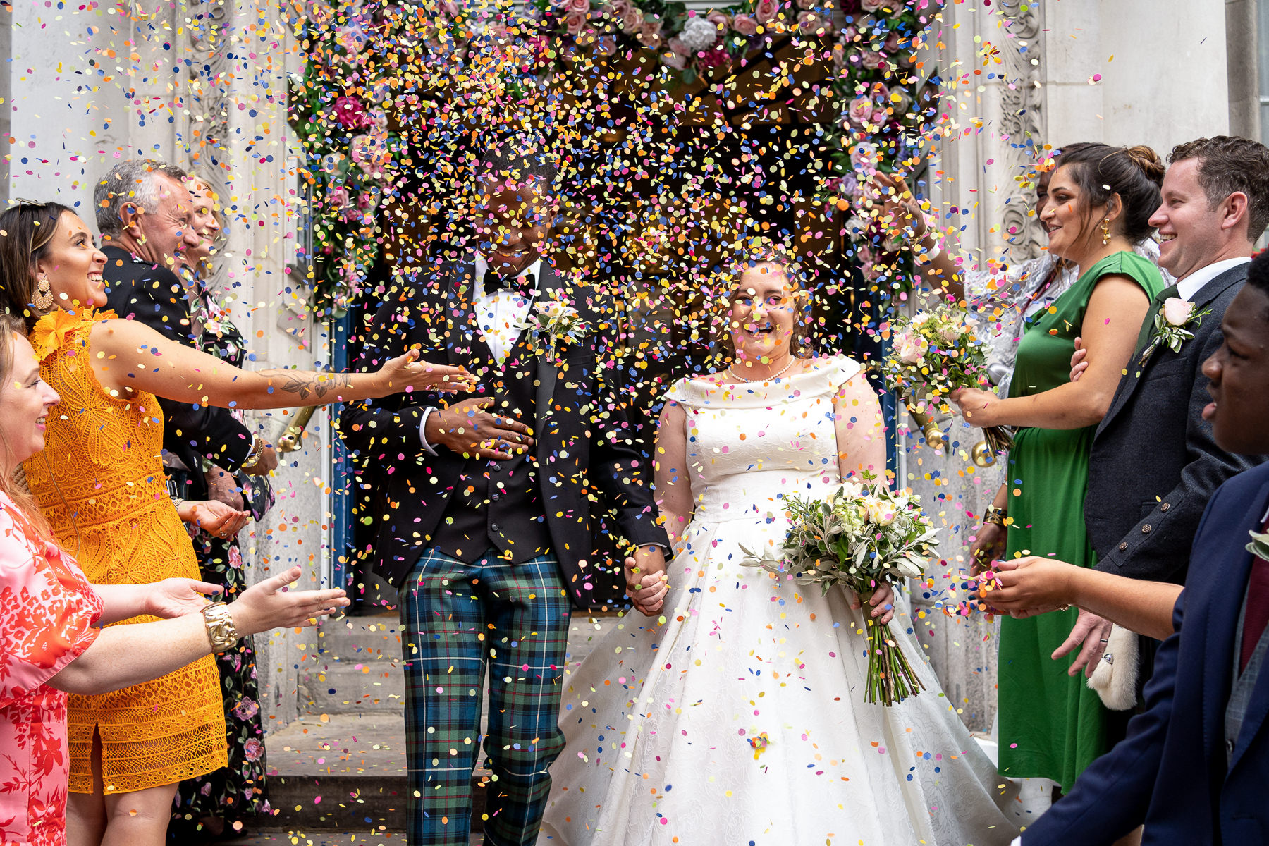 Colourful paper confetti on the steps of the Chelsea Old Town hall after a couple got married